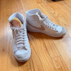 Nike Women's High-Top Sneakers in White with Pink Swoosh